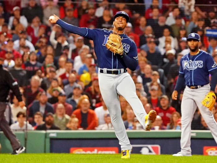 Oct 11, 2021; Boston, Massachusetts, USA; Tampa Bay Rays shortstop Wander Franco (5) throws to first base against the Boston Red Sox during the first inning during game four of the 2021 ALDS at Fenway Park.
